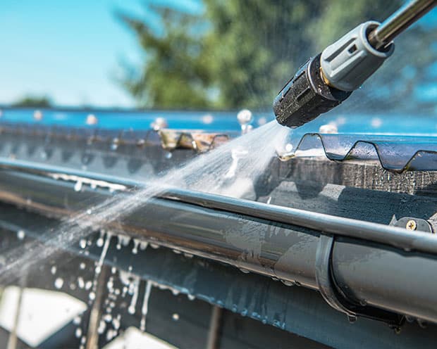 Gutter cleaning before and after on Oahu Hawaii